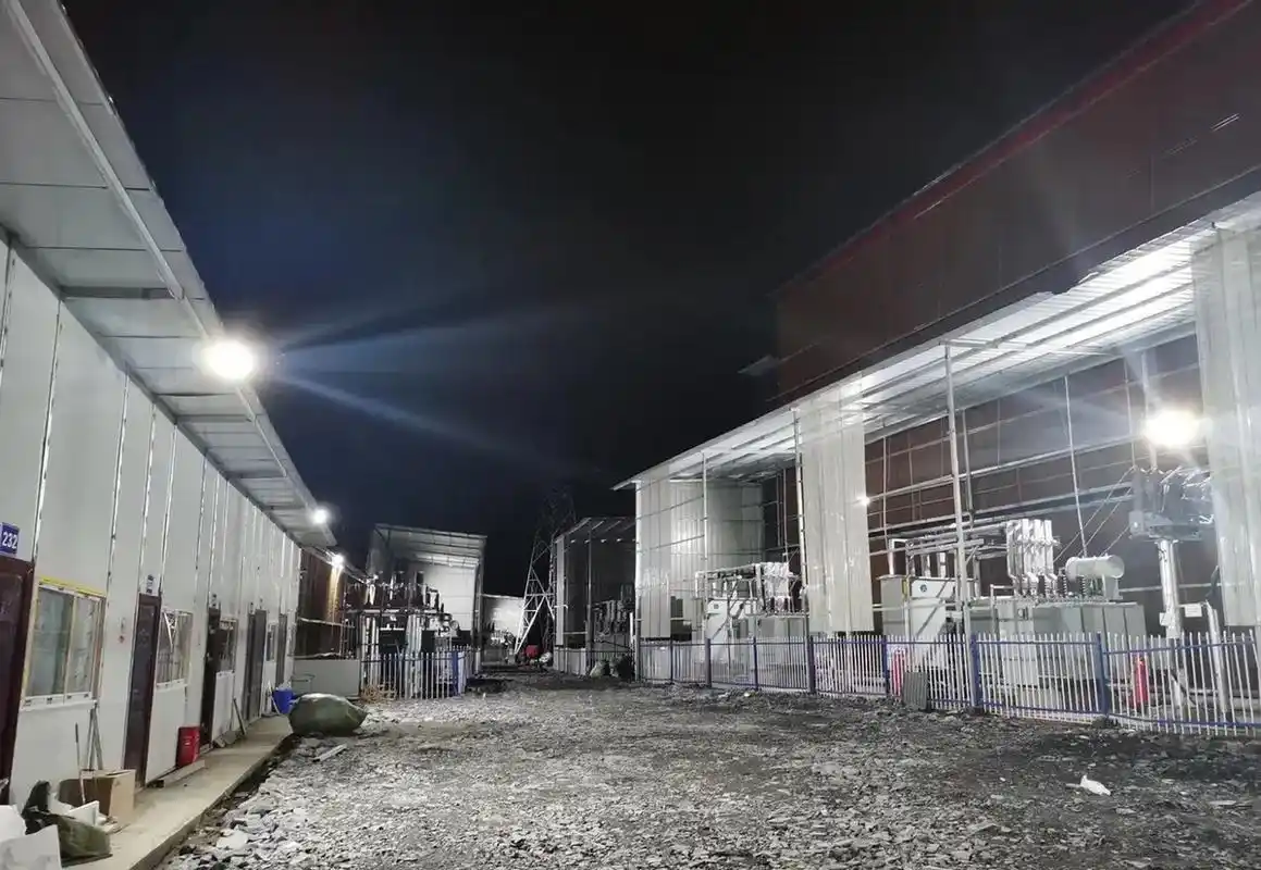 A large-scale Bitcoin mining farm with rows of mining rigs.